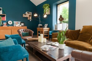 15-inch flat-screen TV with cable channels, TV, books