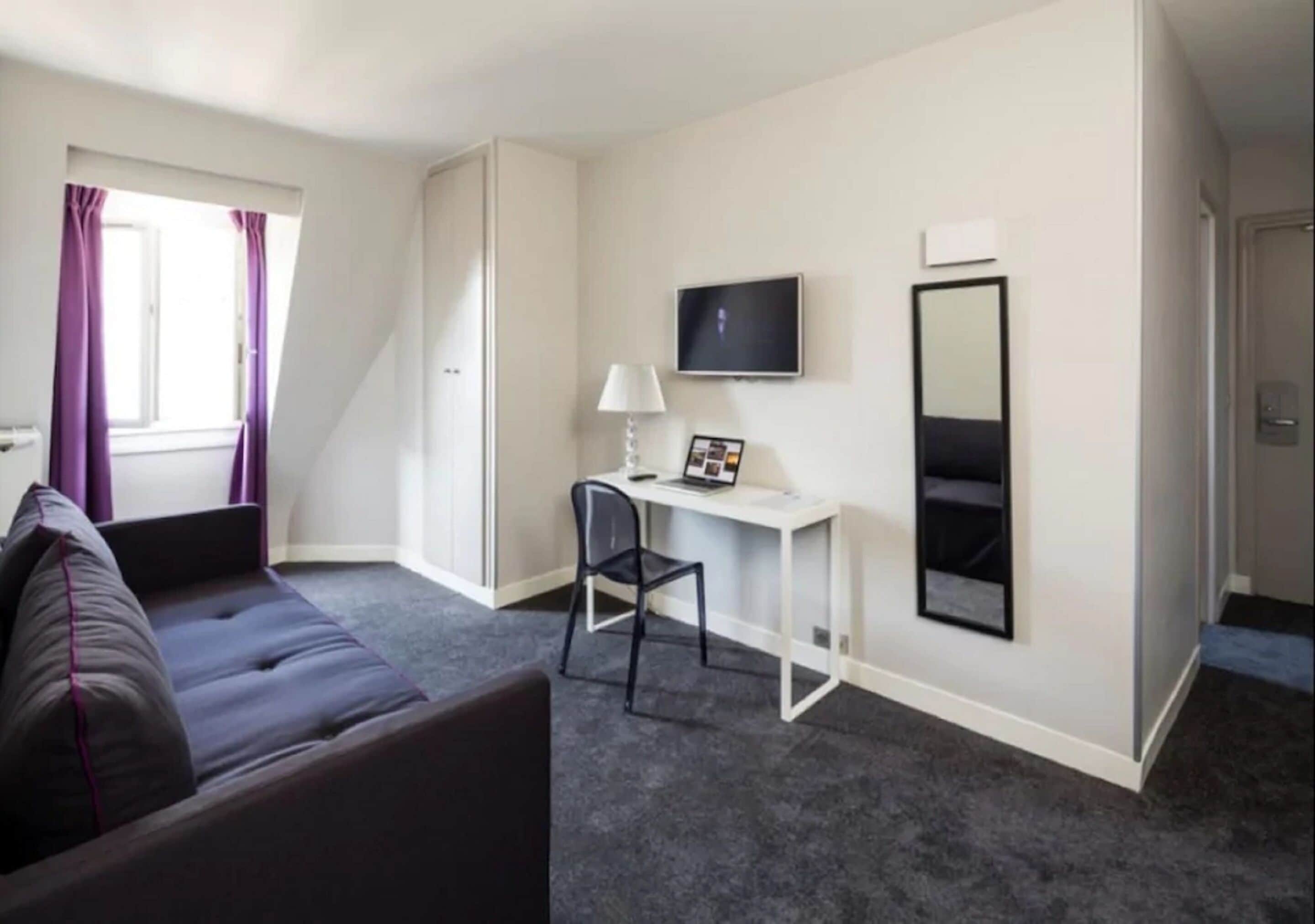 suite (with air conditioning) | living area | flat-screen tv, printers
