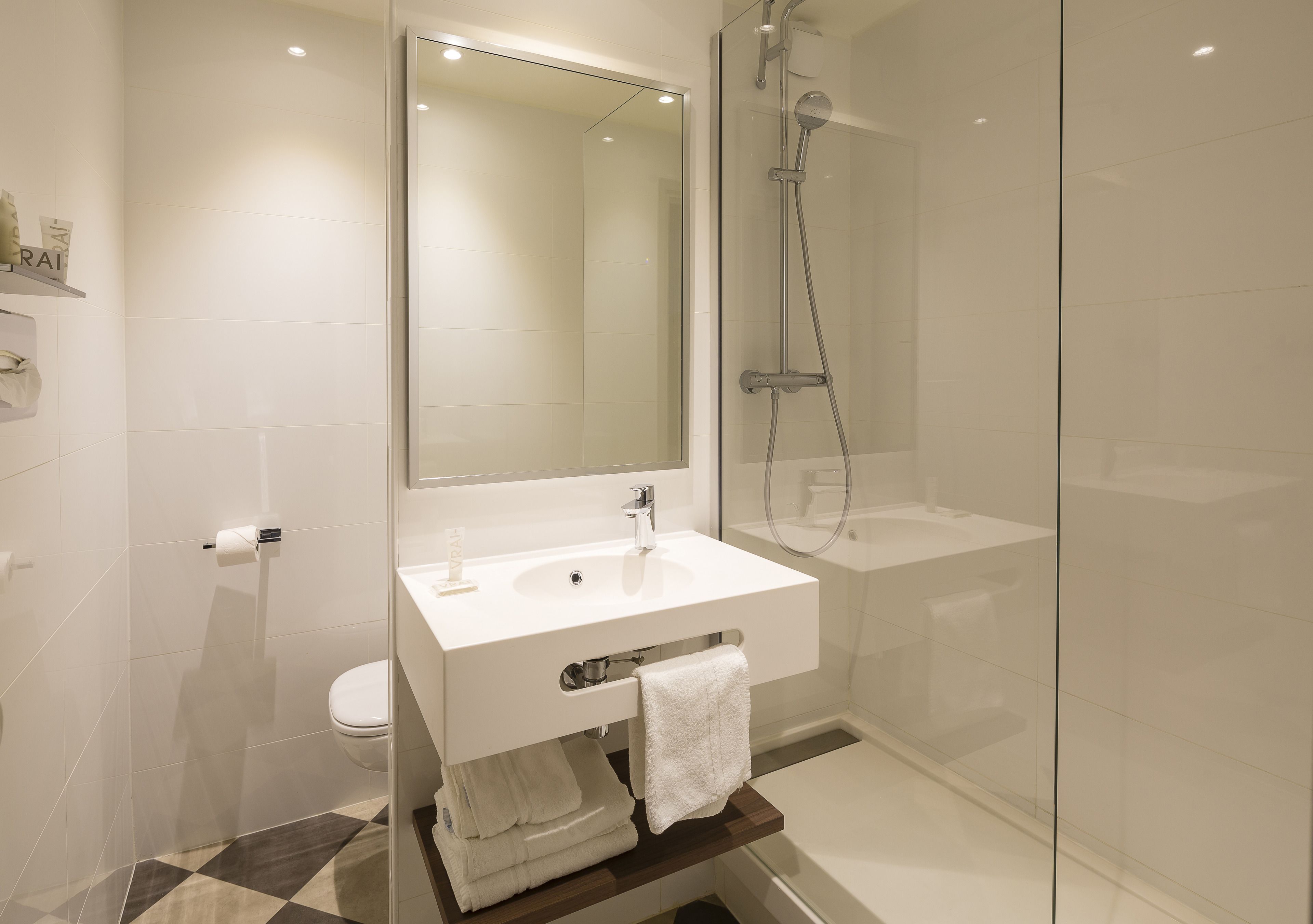 eco-friendly toiletries, hair dryer, towels, soap