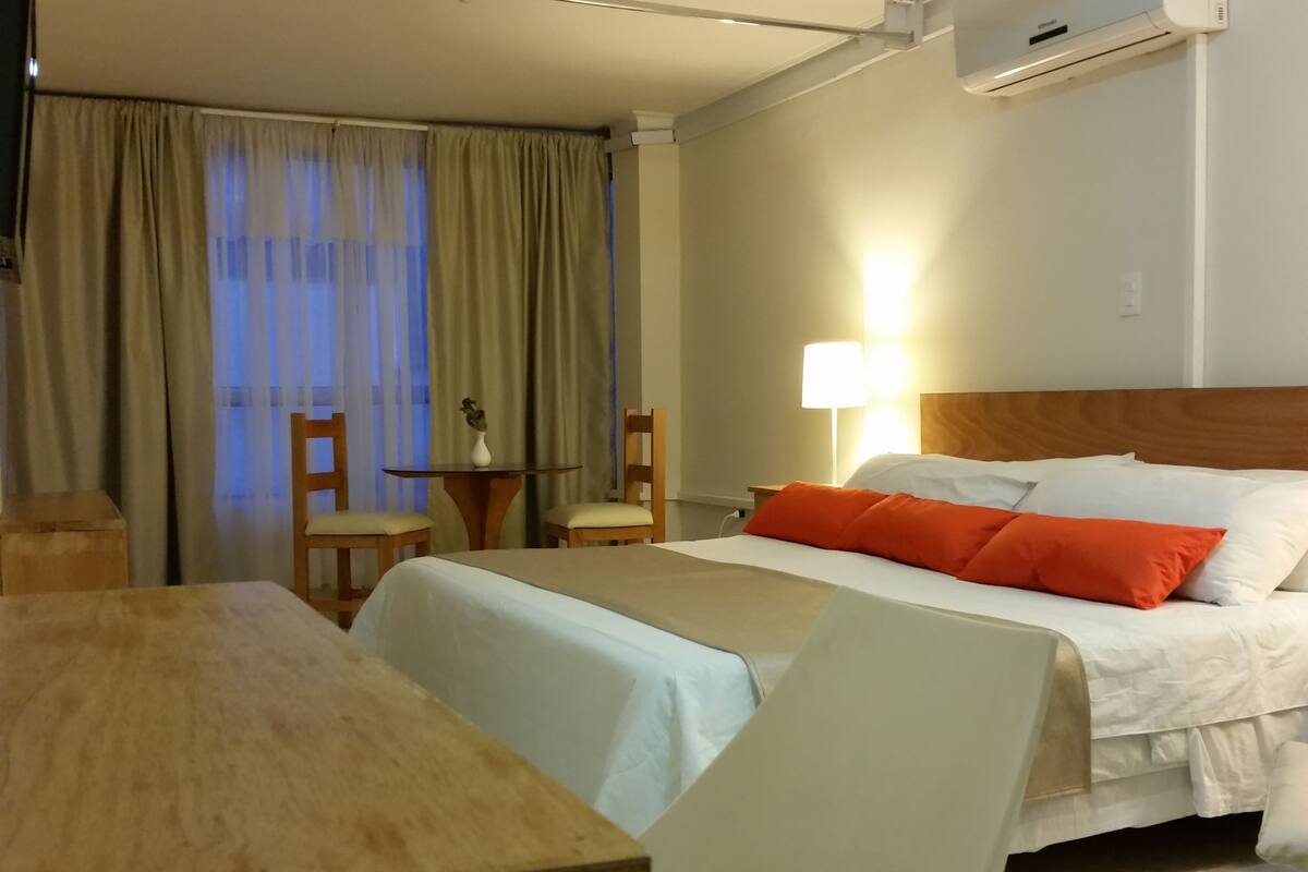 Premium bedding, memory foam beds, desk, blackout drapes