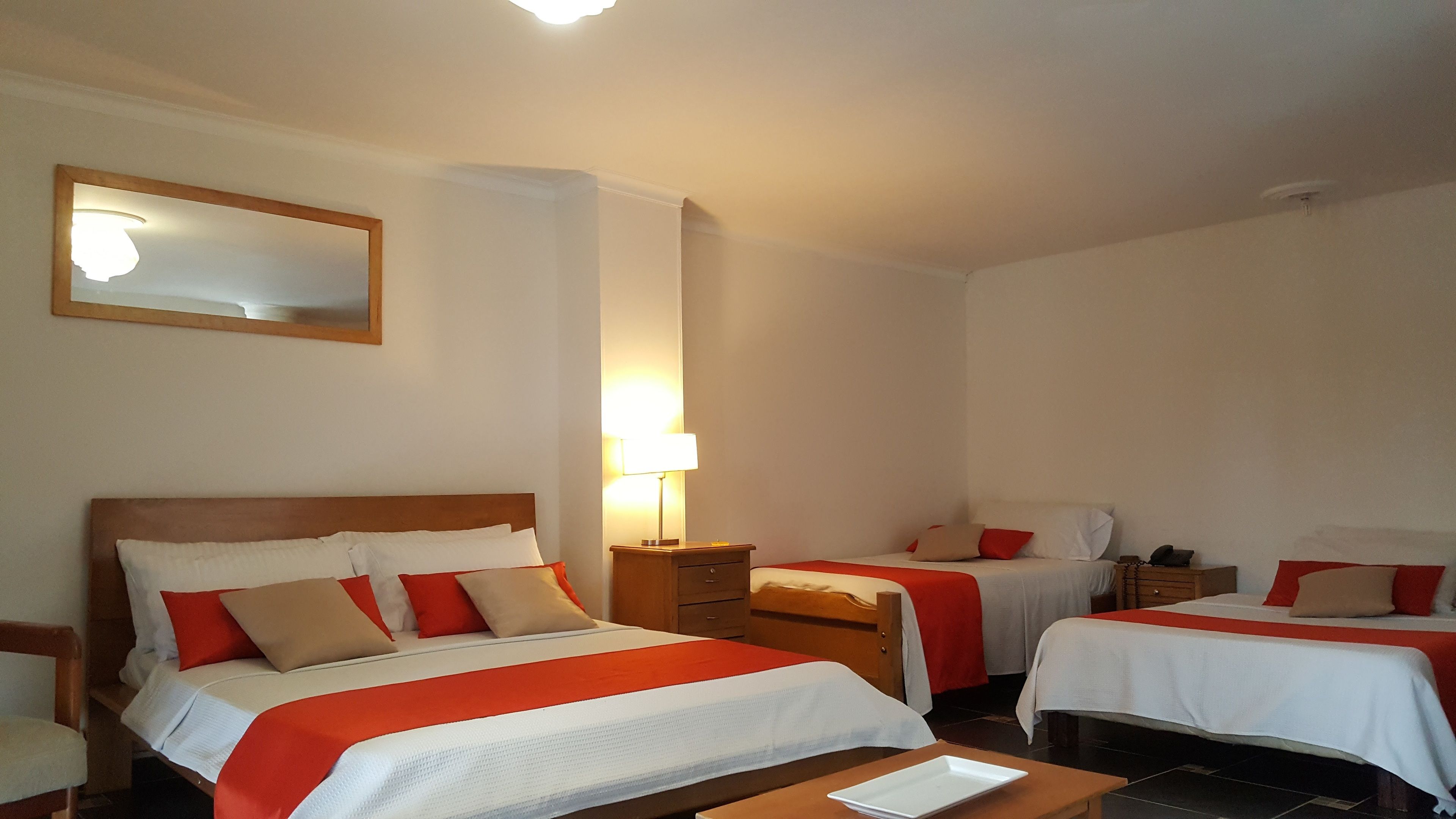 Family Room | Premium bedding, memory foam beds, desk, blackout drapes