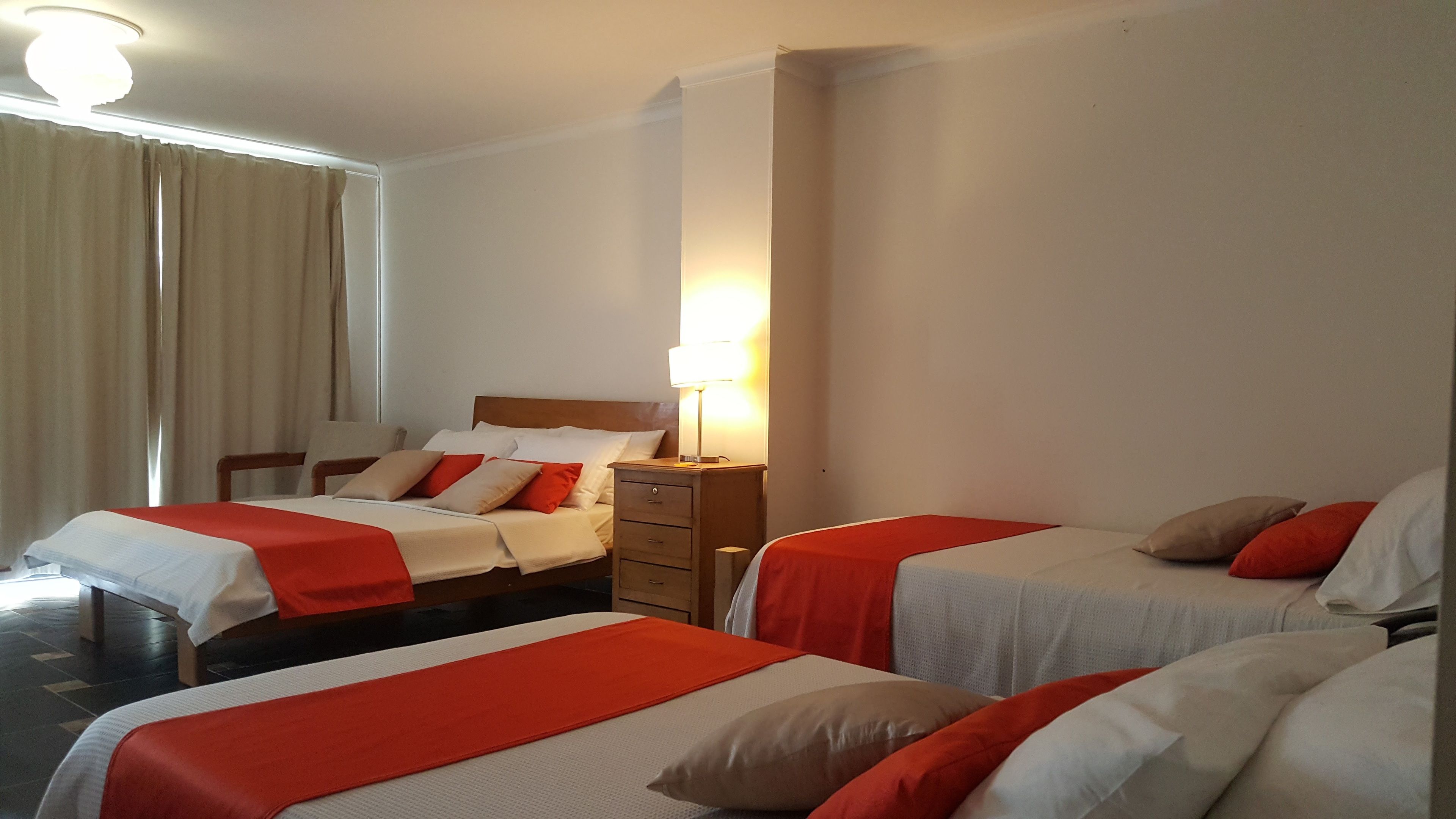 Family Room | Premium bedding, memory foam beds, desk, blackout drapes