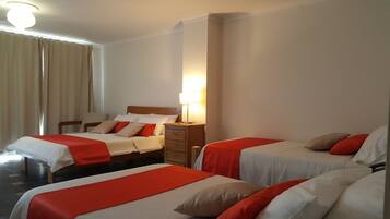 Family Room | Premium bedding, memory foam beds, desk, blackout drapes