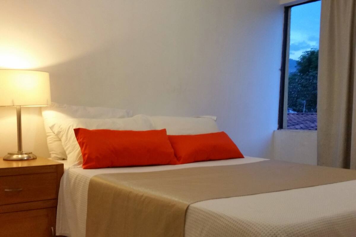 Family Room | Premium bedding, memory foam beds, desk, blackout drapes