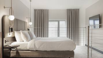 Superior Suite, Multiple Beds, Balcony | Minibar, in-room safe, desk, laptop workspace