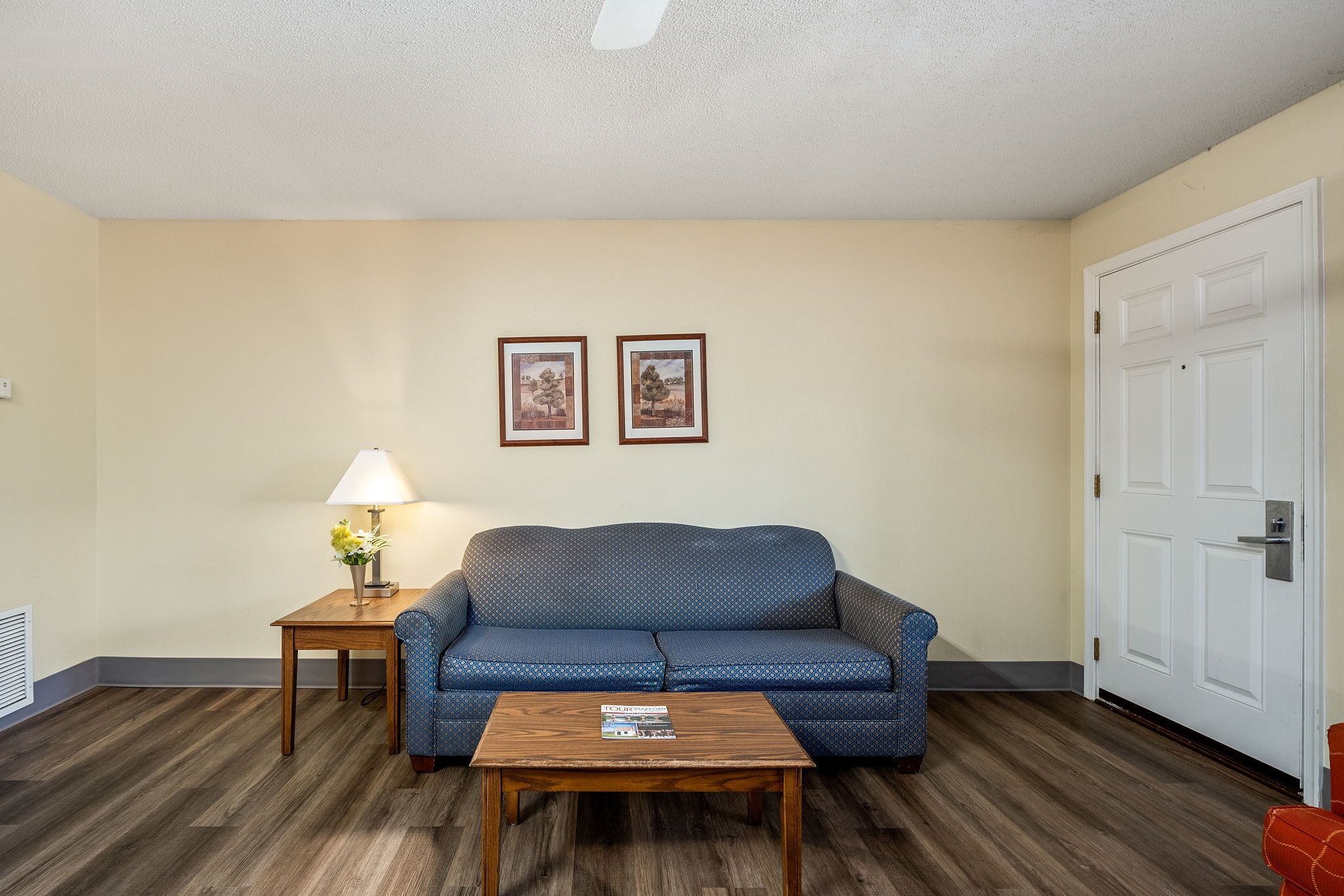 suite, 2 double beds | living area | 32-inch lcd tv with cable channels, tv, dvd player