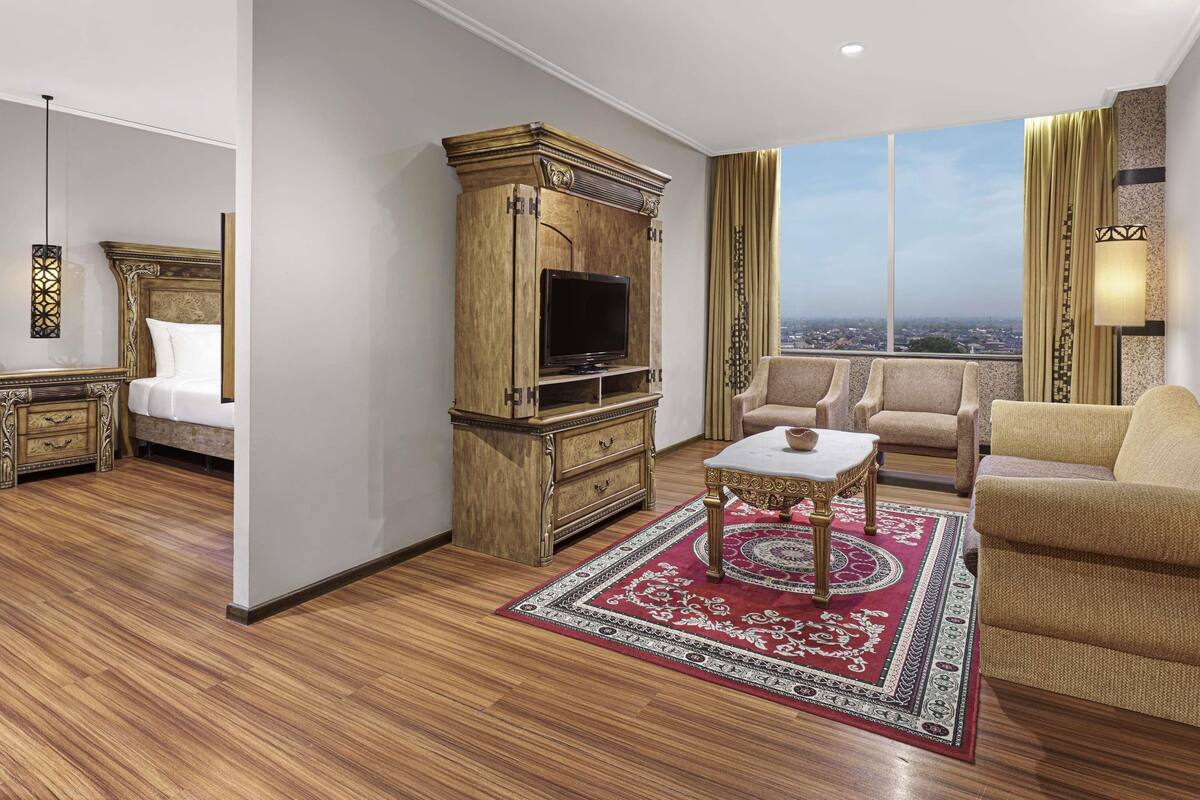 Executive suite, 1 kingsize bed | 1 slaapkamer, luxe beddengoed, donsdekens, een minibar