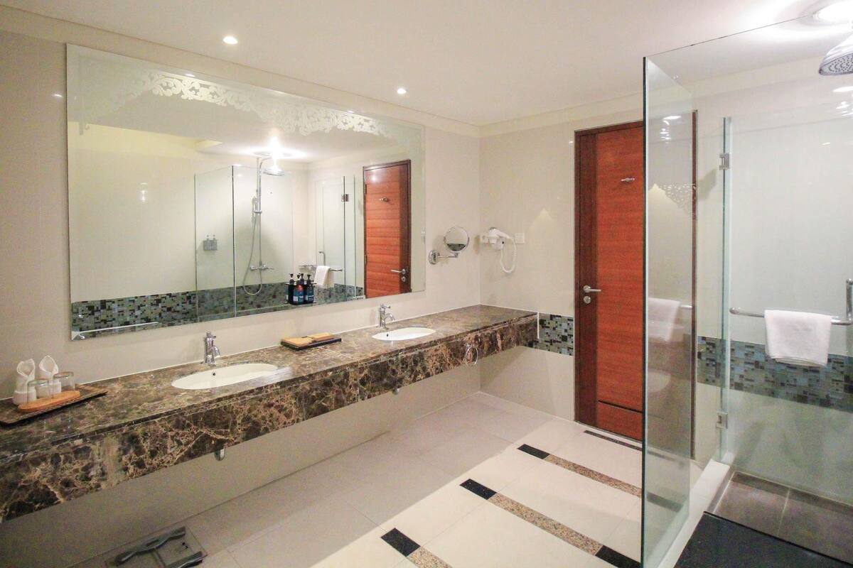 1 slaapkamer, luxe beddengoed, donsdekens, een minibar