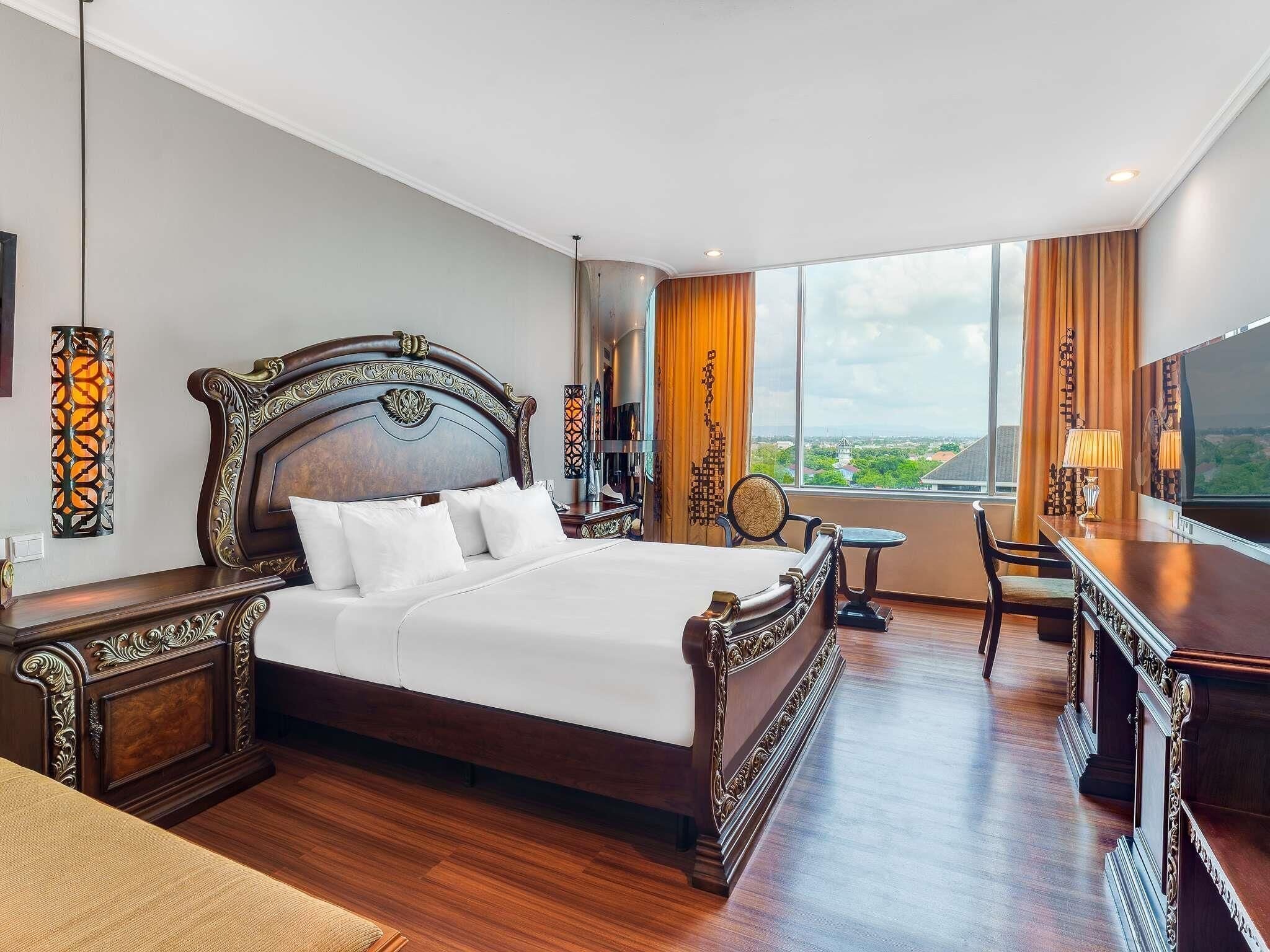 Habitación Deluxe, 1 cama King size | Ropa de cama de alta calidad, edredón y minibar 
