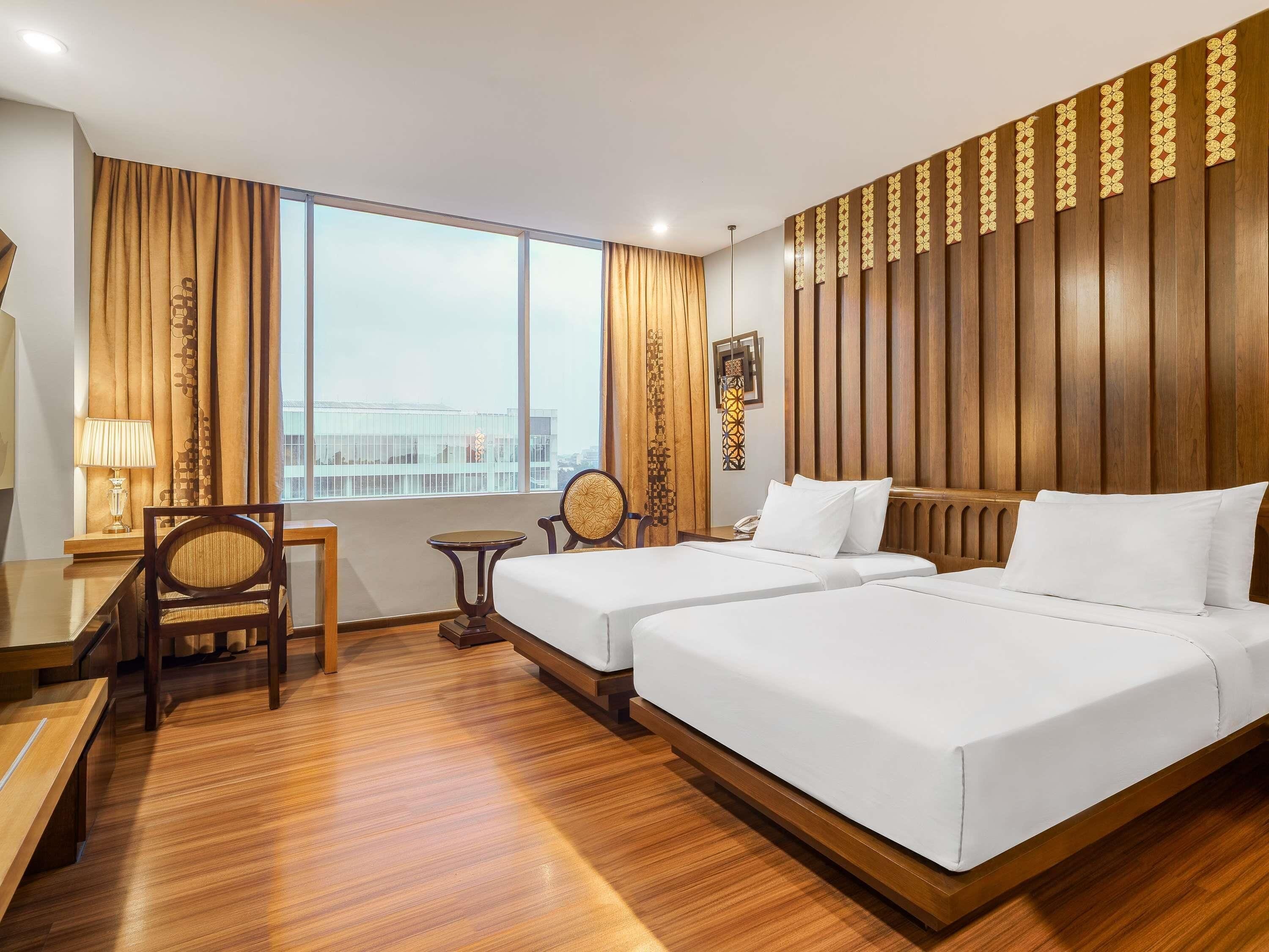 Habitación superior, 2 camas individuales | Ropa de cama de alta calidad, edredón y minibar 