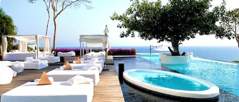 Outdoor pool, open 8:00 AM to 8:00 PM, pool umbrellas, sun loungers