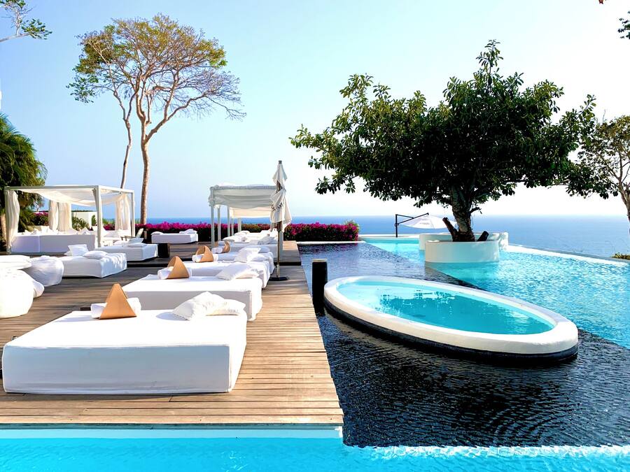 Outdoor pool, open 8:00 AM to 8:00 PM, pool umbrellas, pool loungers