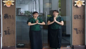 The entrance of Orchid Thai Spa with two staff members standing in front. - Greenpark Chennai (Chennai)