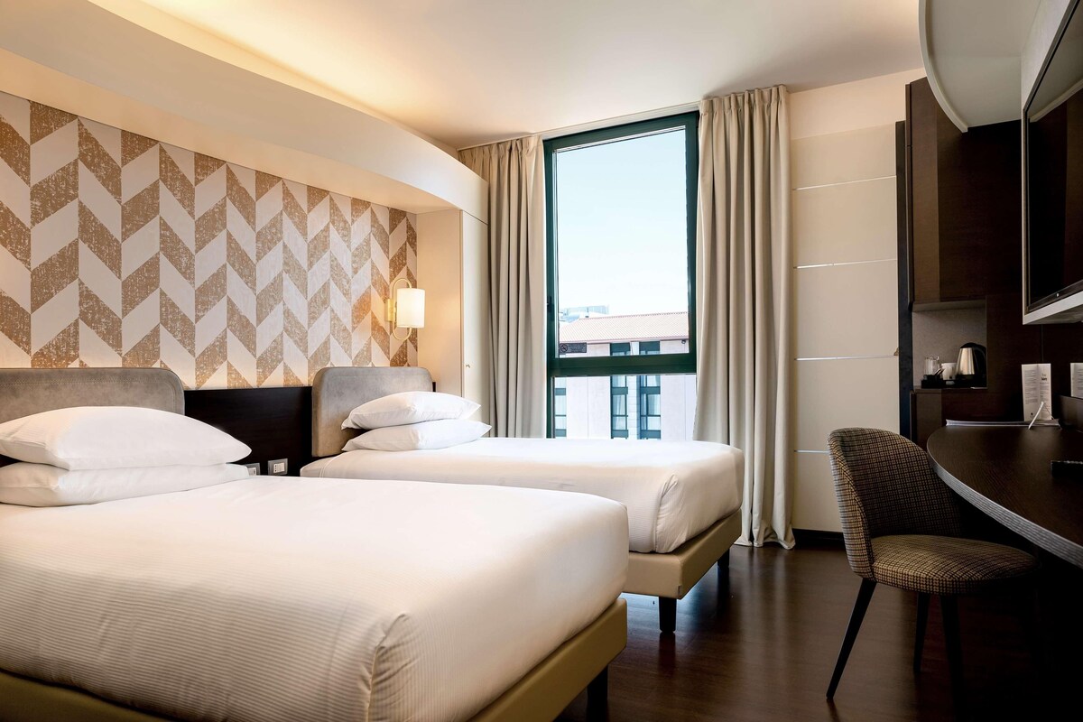 Down duvets, minibar, in-room safe, desk