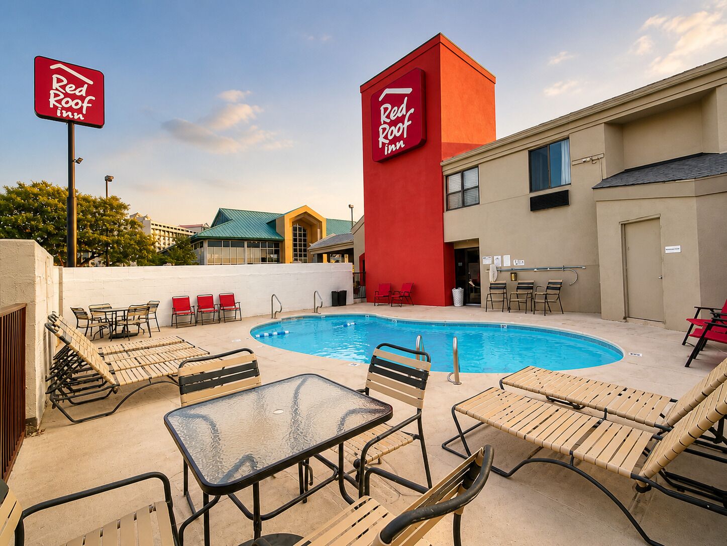 Seasonal outdoor pool, open 9:00 AM to 9:00 PM, pool umbrellas