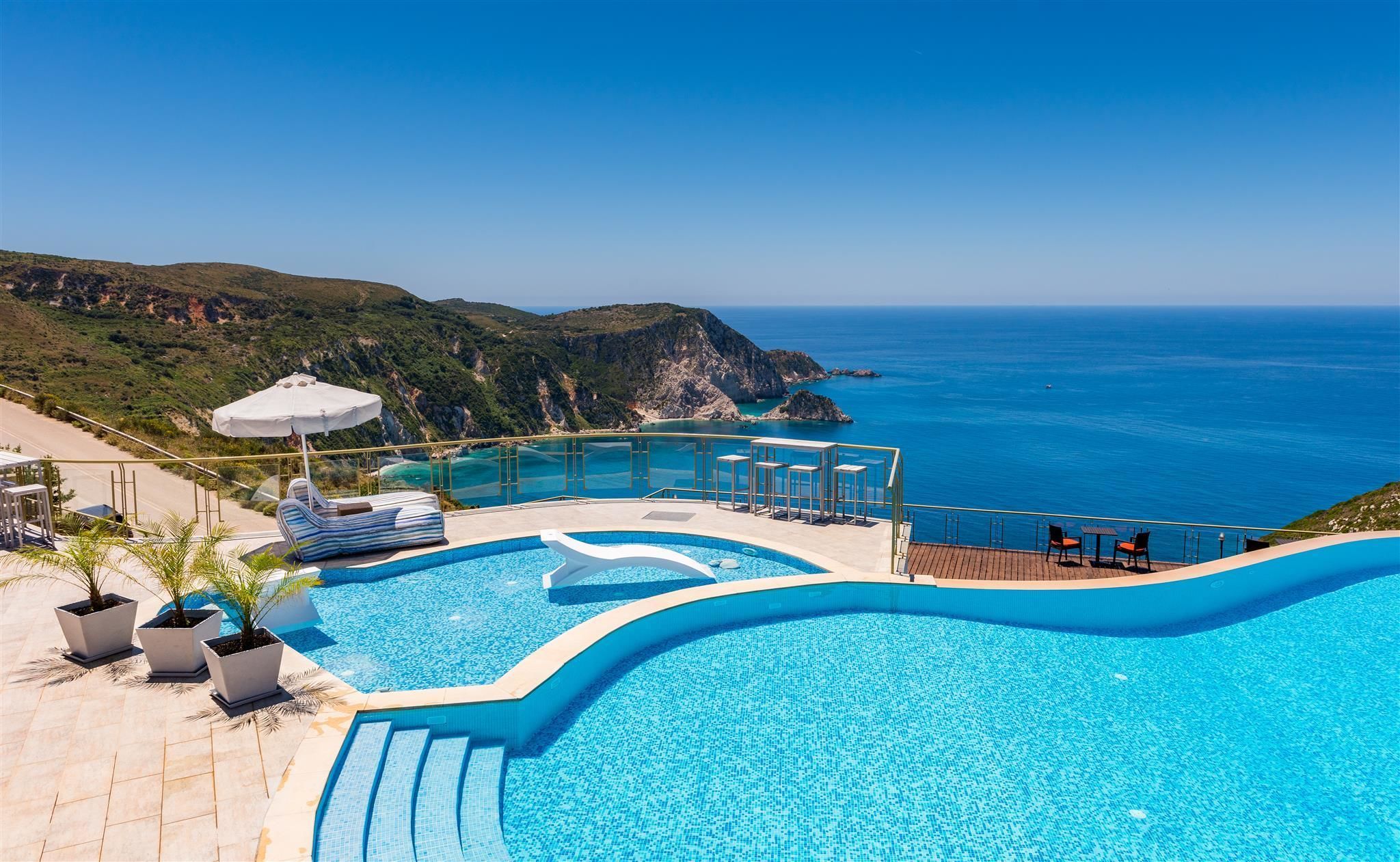 Seasonal outdoor pool, pool umbrellas, sun loungers