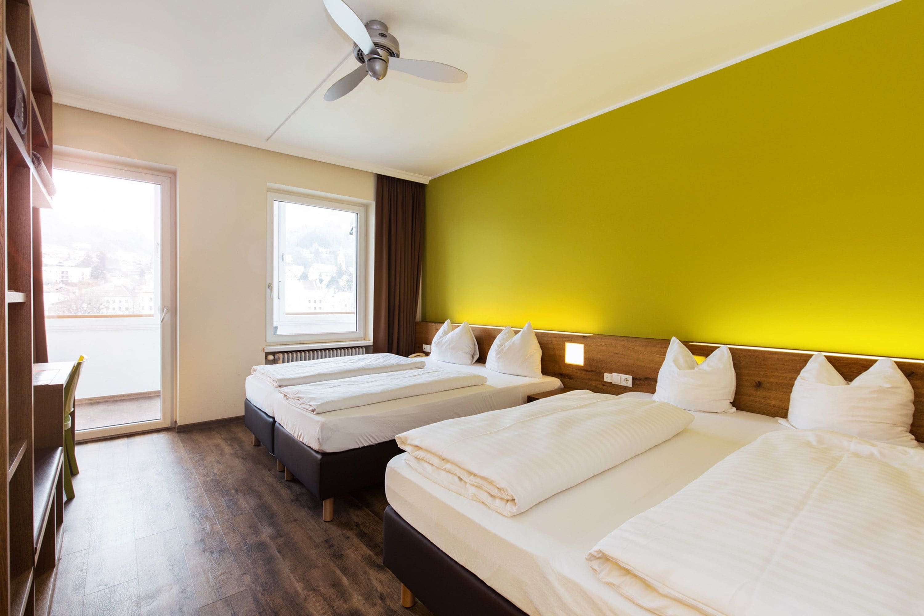 quadruple room | 1 bedroom, select comfort beds, in-room safe, desk