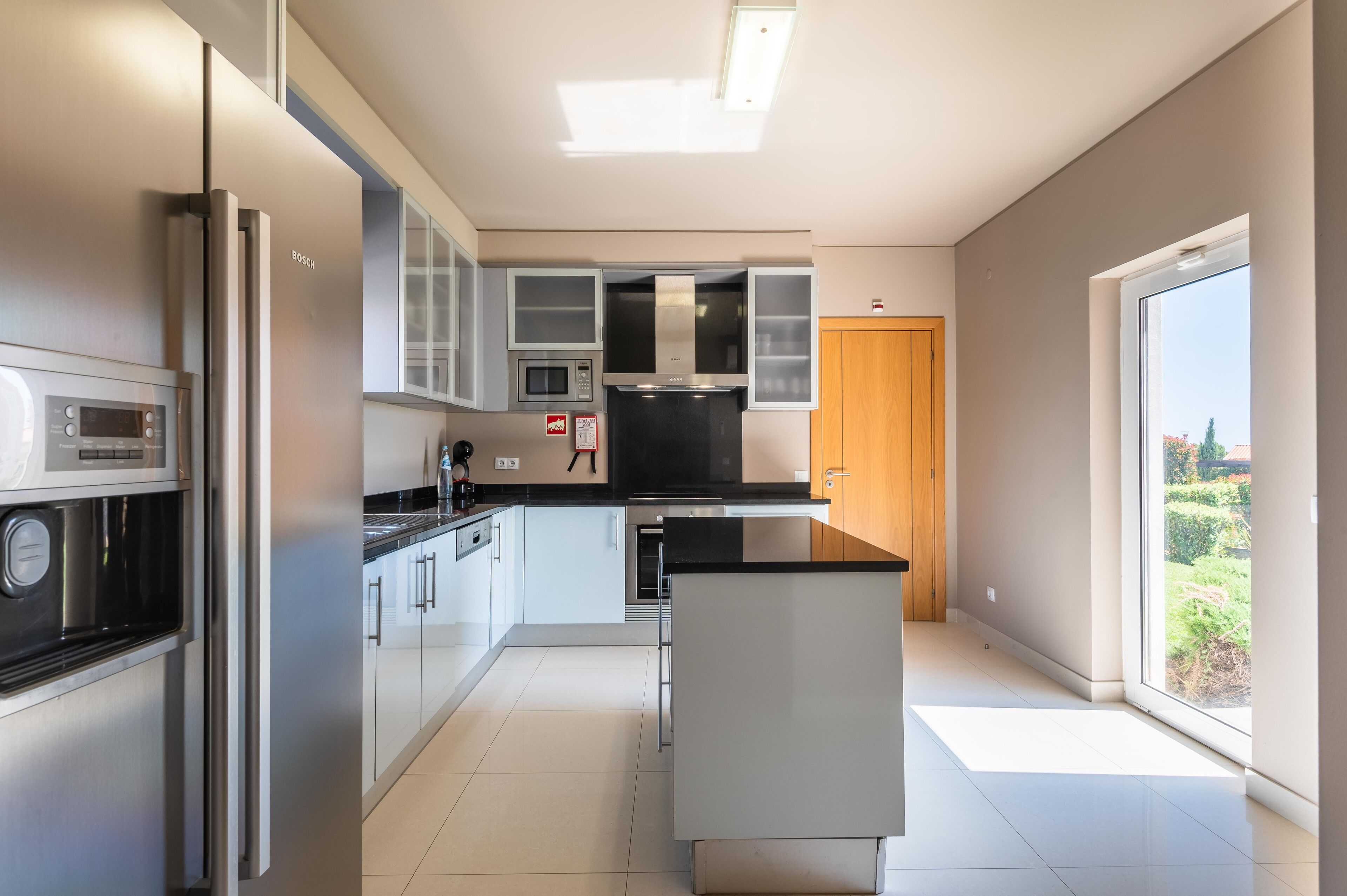 villa, 3 bedrooms | private kitchen | full-sized fridge, microwave, stovetop, dishwasher