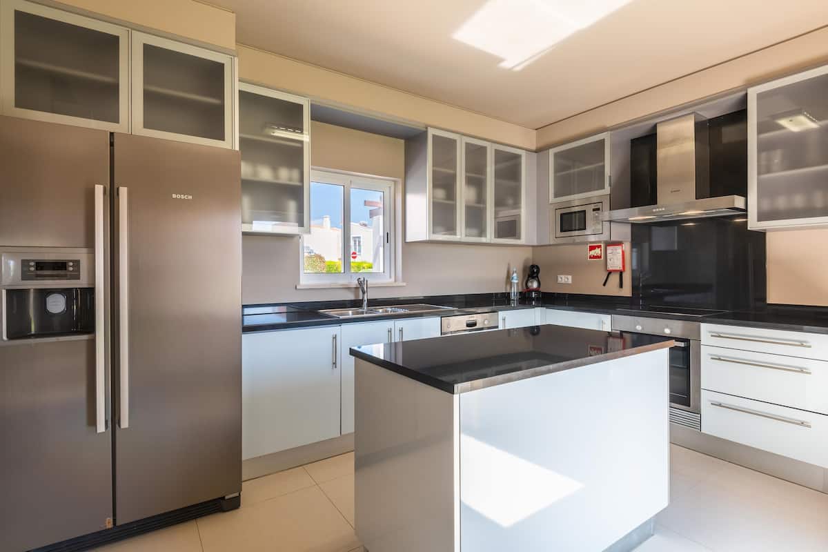 villa, 3 bedrooms | private kitchen | full-sized fridge, microwave, stovetop, dishwasher