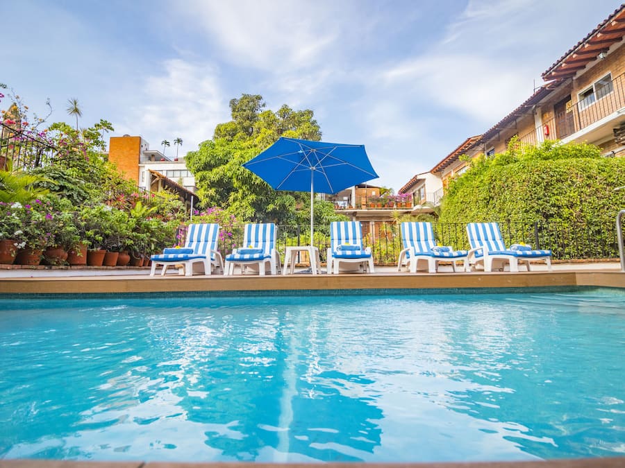 Outdoor pool, pool umbrellas, pool loungers