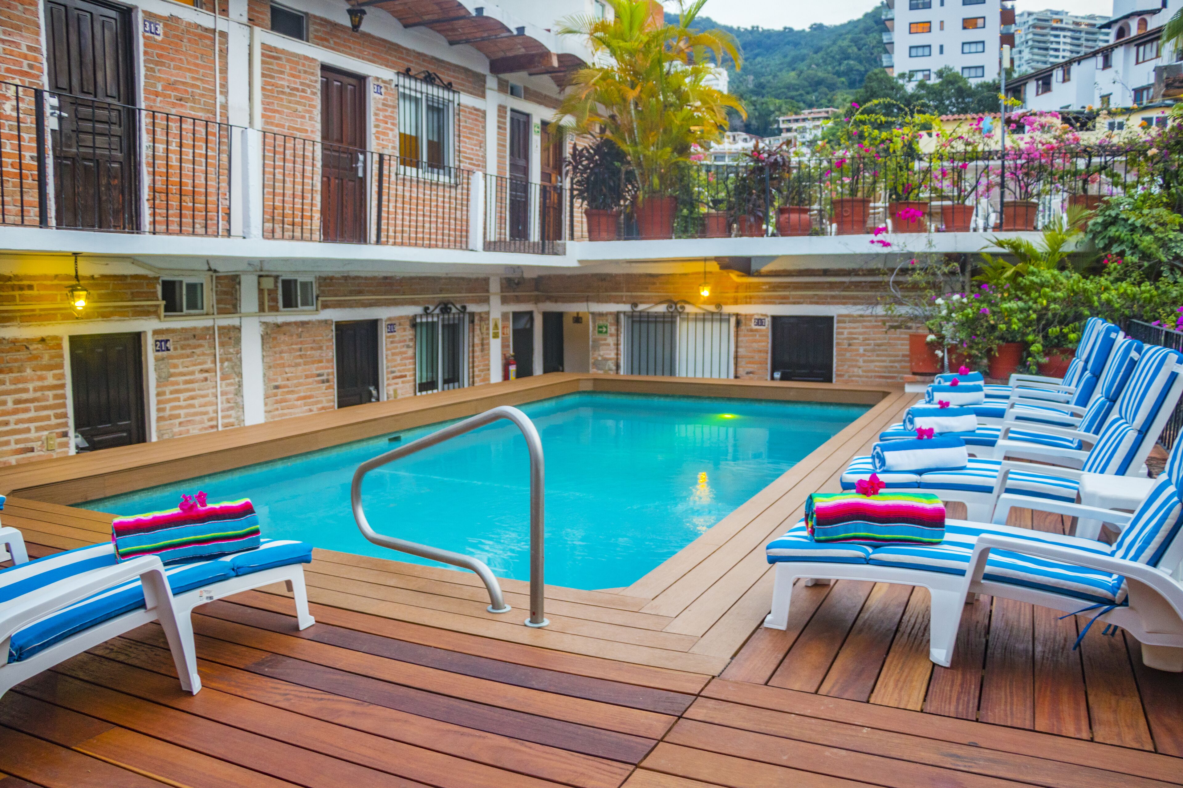 Outdoor pool, pool umbrellas, pool loungers