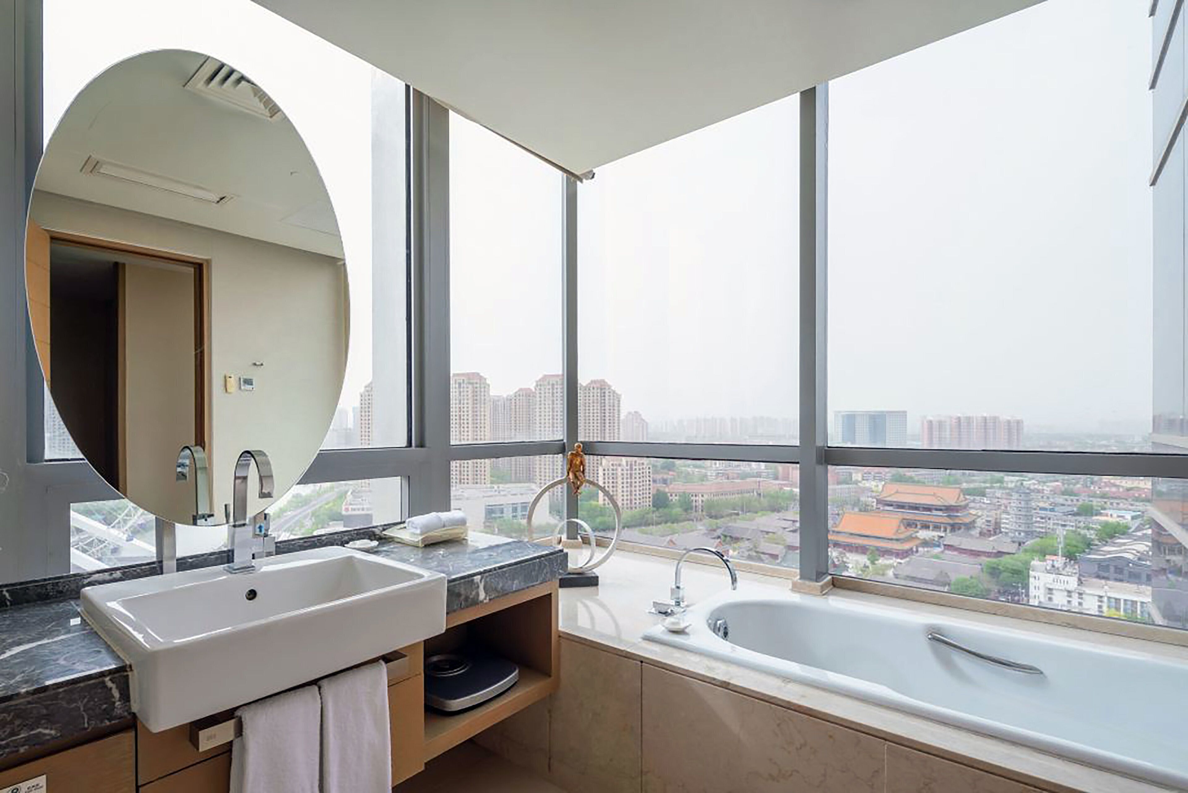 suite, 1 bedroom (tj eye view) | bathroom | shower, hair dryer, towels