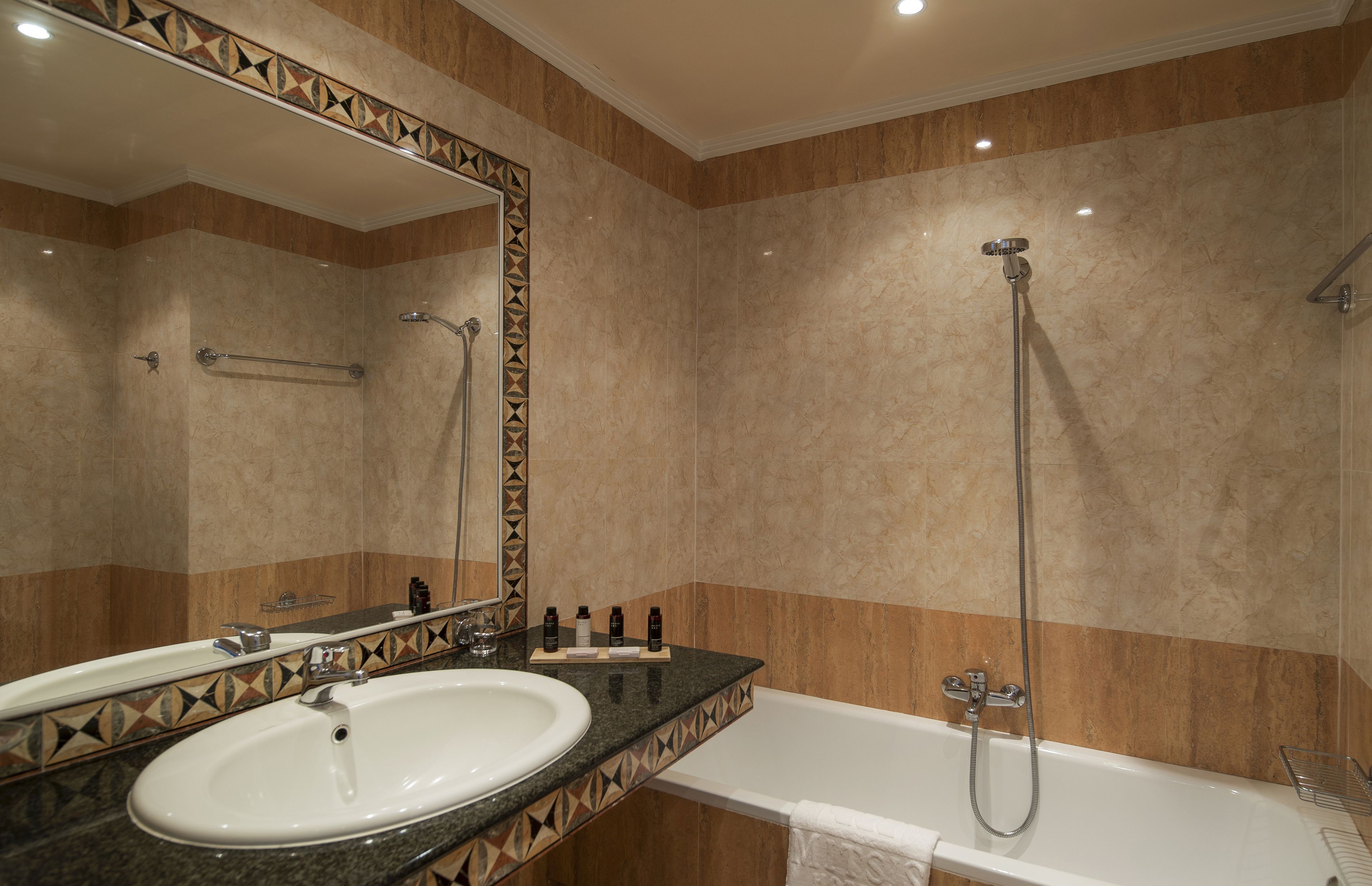 bathtub, free toiletries, hair dryer, dressing gowns