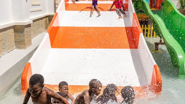 A water play area with slides and water features. - PrideInn Hotel Diani (Diani Beach)