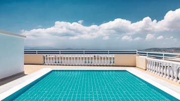 2 outdoor pools, pool umbrellas, sun loungers