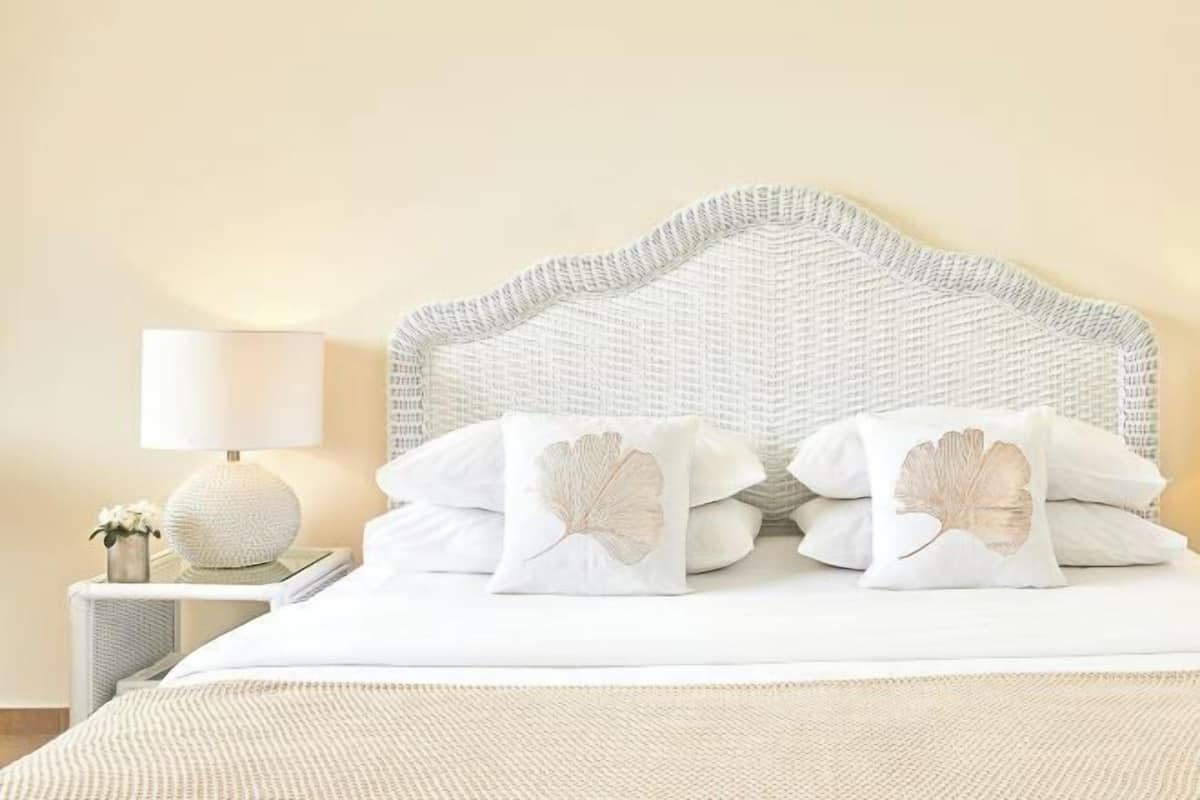 Ropa de cama de alta calidad y minibar