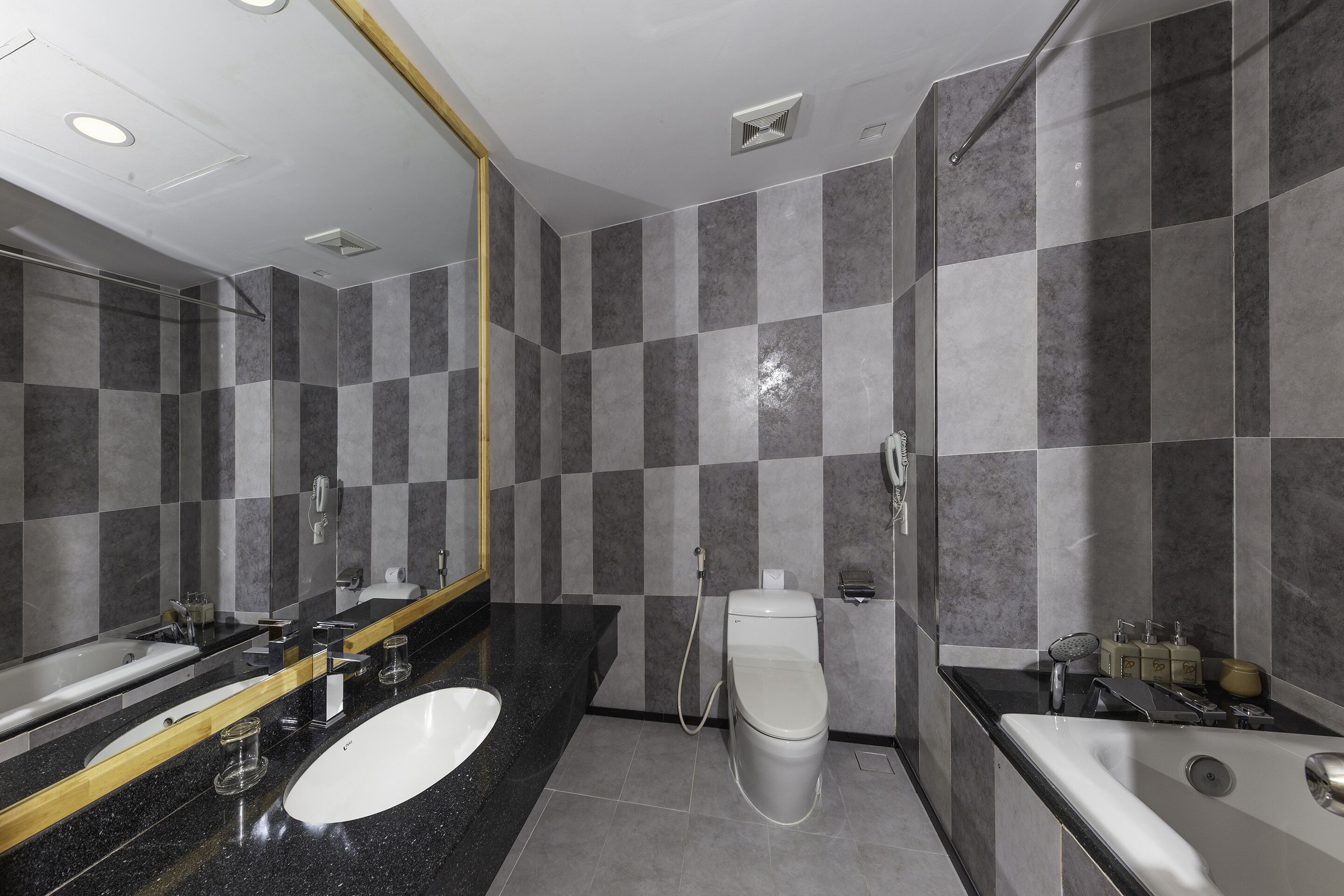 superior room | bathroom | combined shower/bathtub, deep-soaking bathtub, designer toiletries
