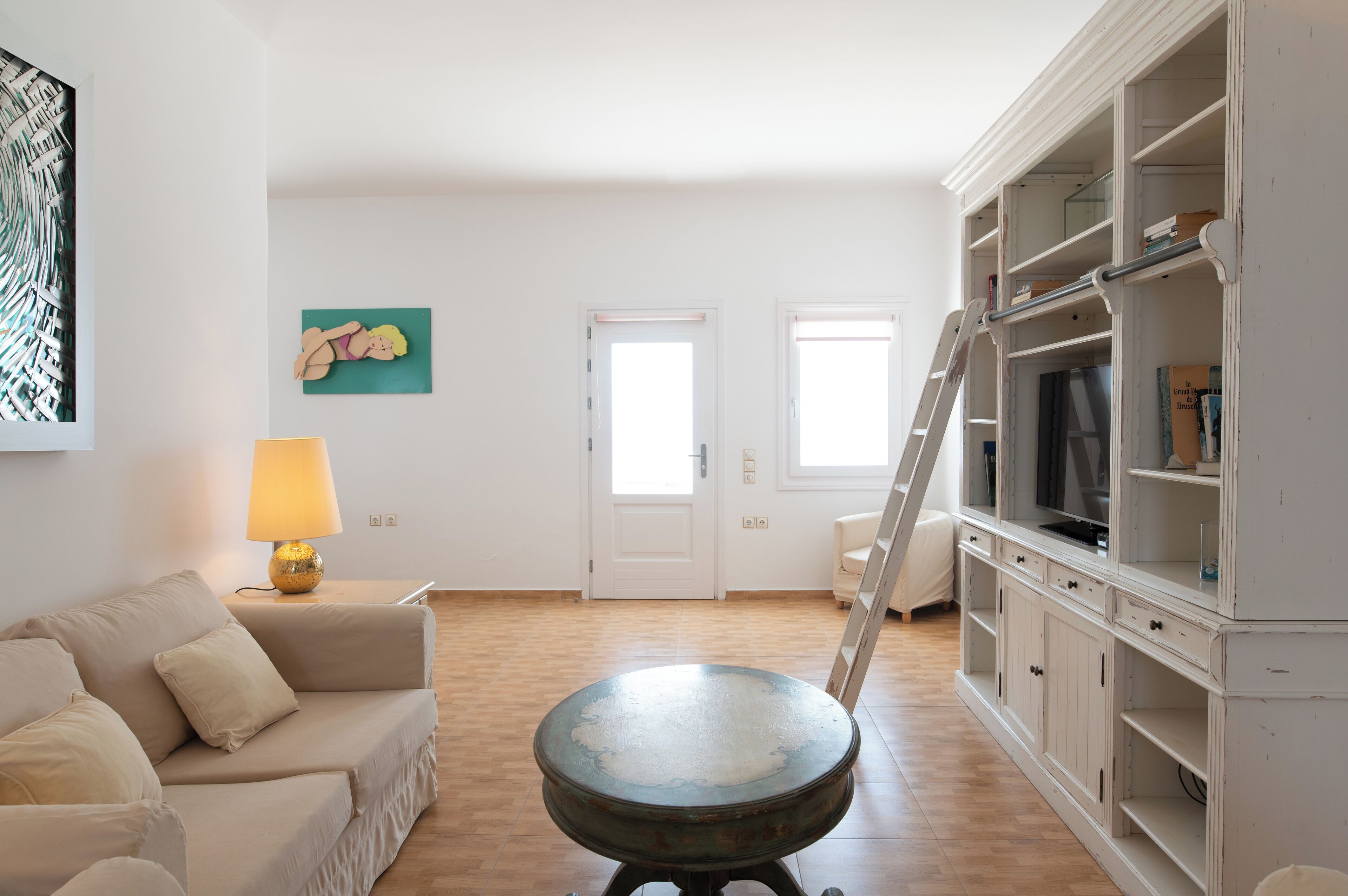 grand villa, caldera view | living area | 44-cm flat-screen tv with satellite channels, tv, dvd player