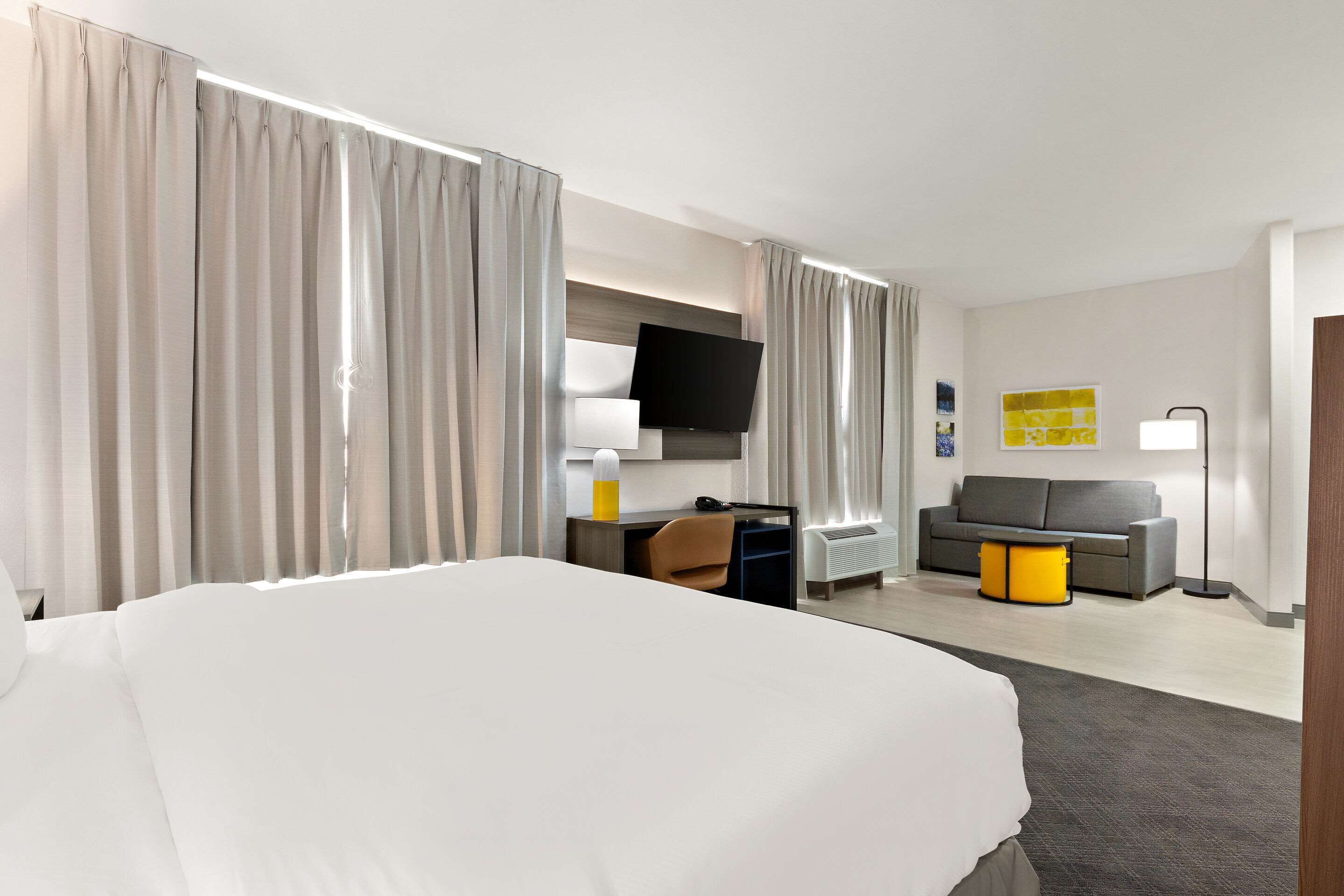 suite, 1 king bed with sofa bed, accessible, non smoking | desk, iron/ironing board, free cots/infant beds, free wifi