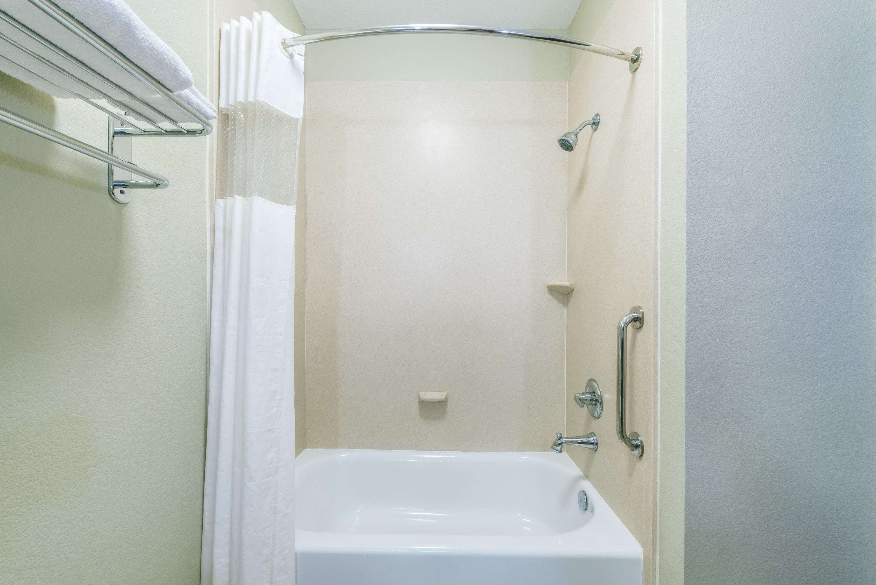 combined shower/bathtub, free toiletries, hair dryer, towels