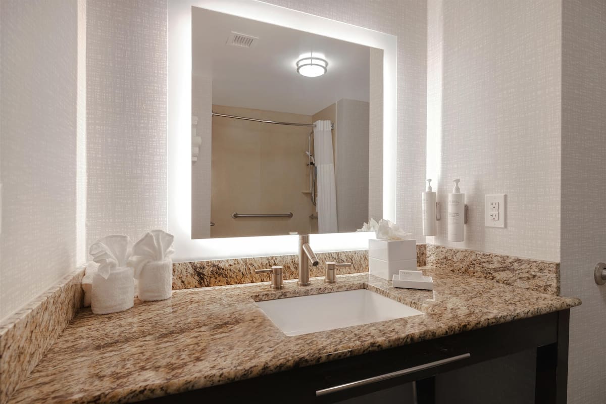 Combined shower/tub, eco-friendly toiletries, hair dryer, towels