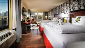 Premium bedding, down comforters, pillowtop beds, in-room safe