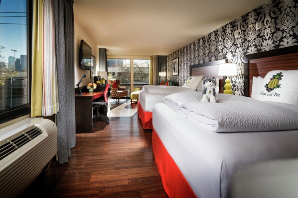 Premium bedding, down duvets, pillow-top beds, in-room safe