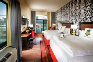 Premium bedding, down comforters, pillowtop beds, in-room safe