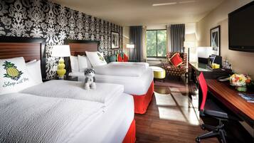 Premium bedding, down comforters, pillowtop beds, in-room safe