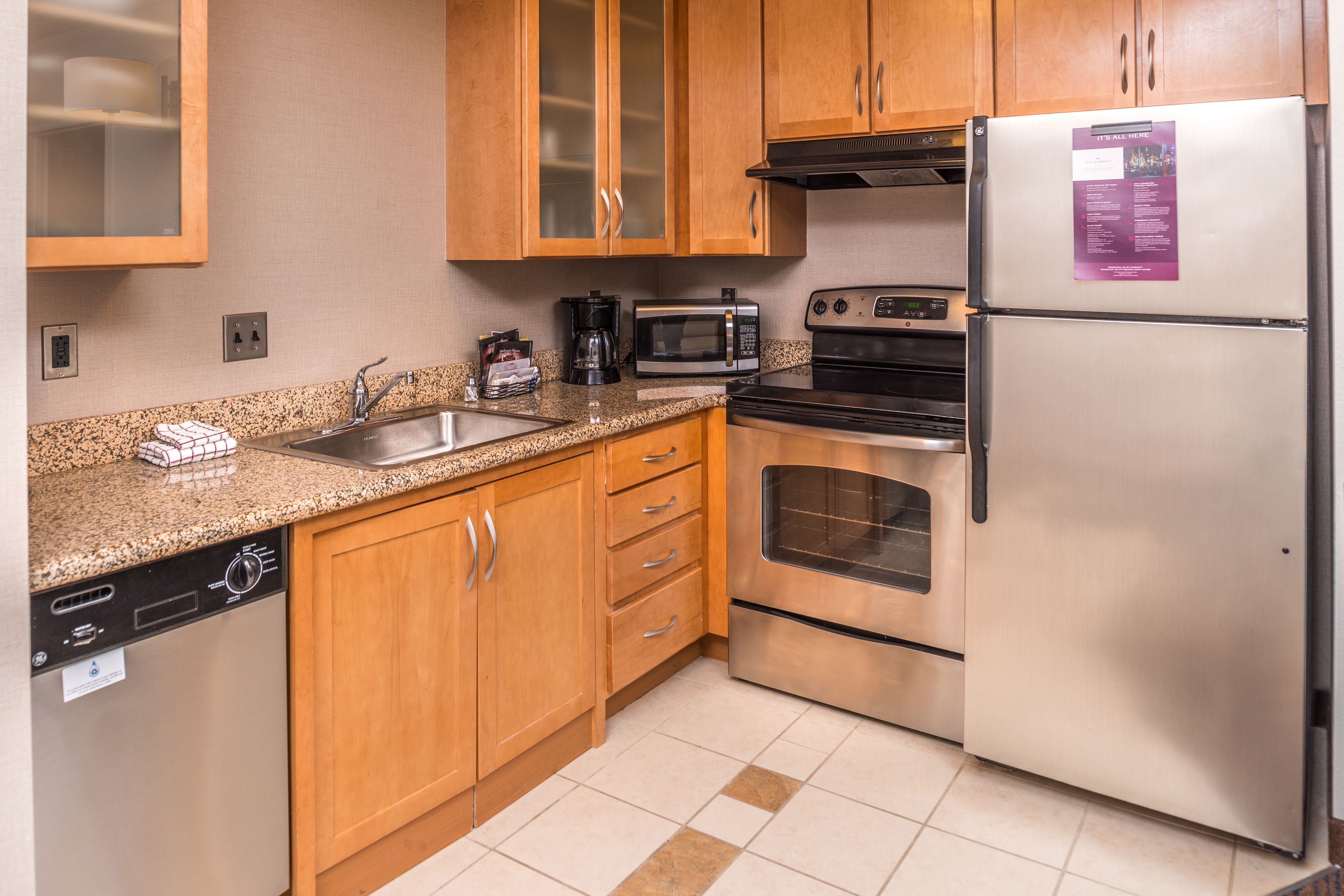 suite, 2 bedrooms | private kitchen | full-sized fridge, microwave, stovetop, dishwasher