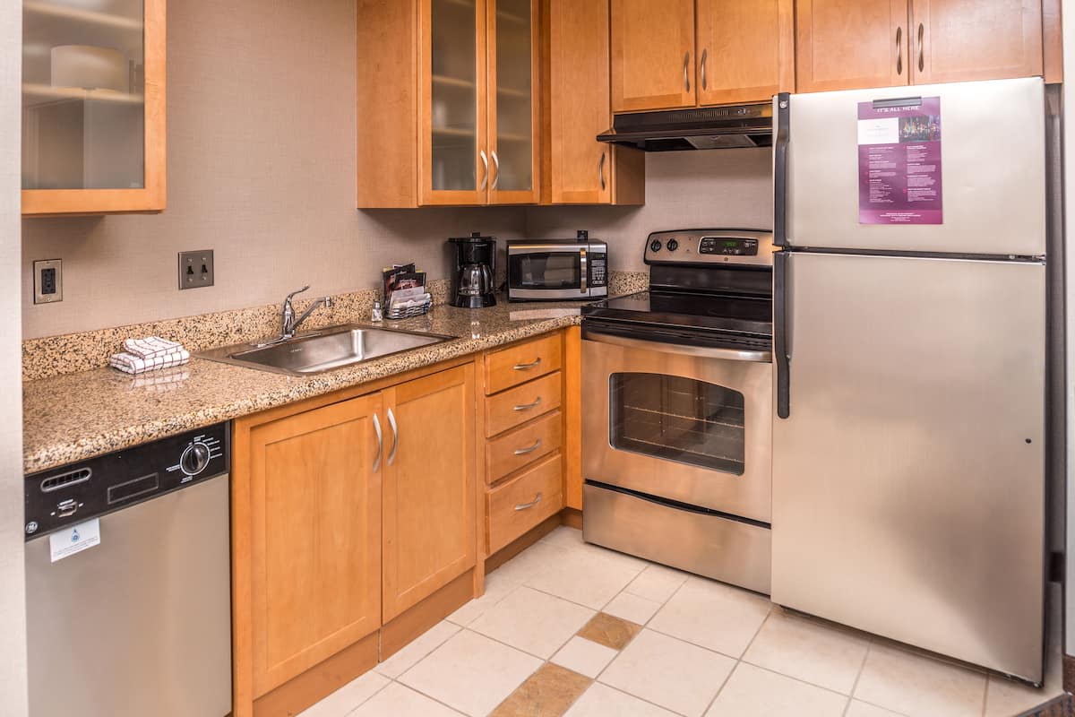 suite, 2 bedrooms | private kitchen | full-sized fridge, microwave, stovetop, dishwasher