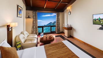 Deluxe Room, 1 Queen Bed, Mountain View | 1 bedroom, in-room safe, desk, blackout curtains