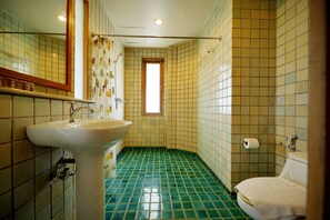 Superior Room | Bathroom | Shower, hair dryer, bathrobes, slippers