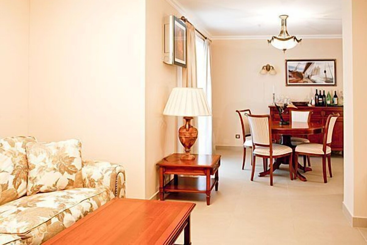 Suite, Balcony, Sea View | Living area | 51-cm TV with satellite channels