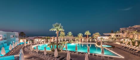 2 outdoor pools, pool umbrellas, sun loungers