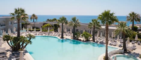 2 outdoor pools, pool umbrellas, pool loungers