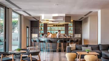 5 bars/lounges, poolside bar, beach bar