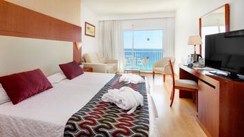 Ropa de cama de alta calidad, minibar, escritorio