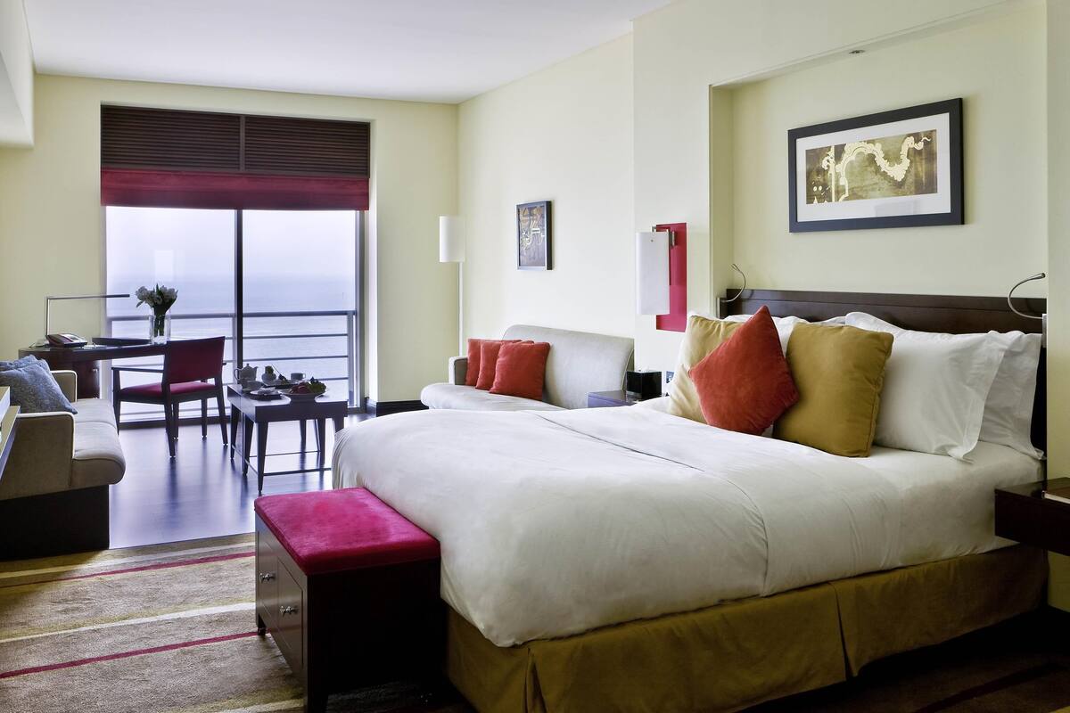 Junior Suite, 1 Queen Bed, Club Lounge Access, Sea View | Frette Italian sheets, premium bedding, down comforters, pillowtop beds