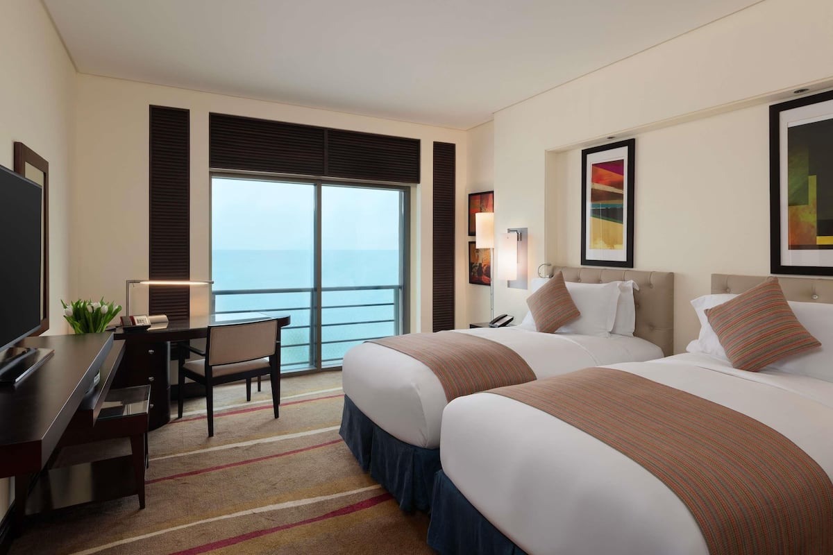 Luksusrom, 2 enkeltsenger, sjøutsikt | Italienske Frette-laken, sengetøy av topp kvalitet og dundyner